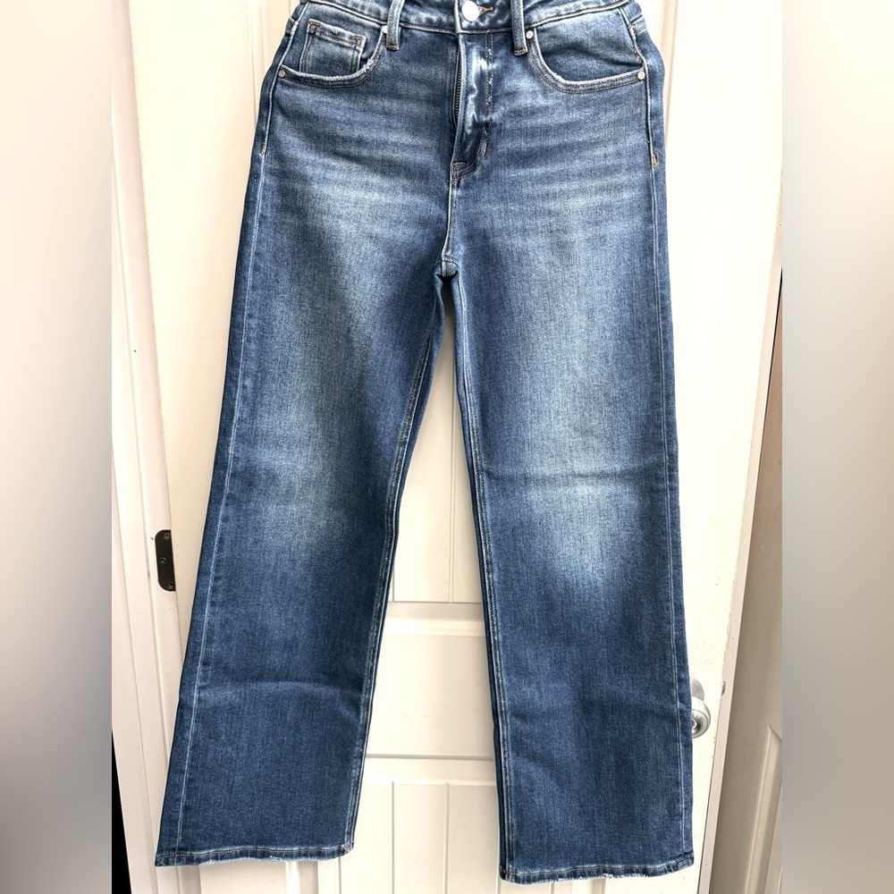 Risen High Rise Blue Flare Wide Leg Jeans with Vintage Fading